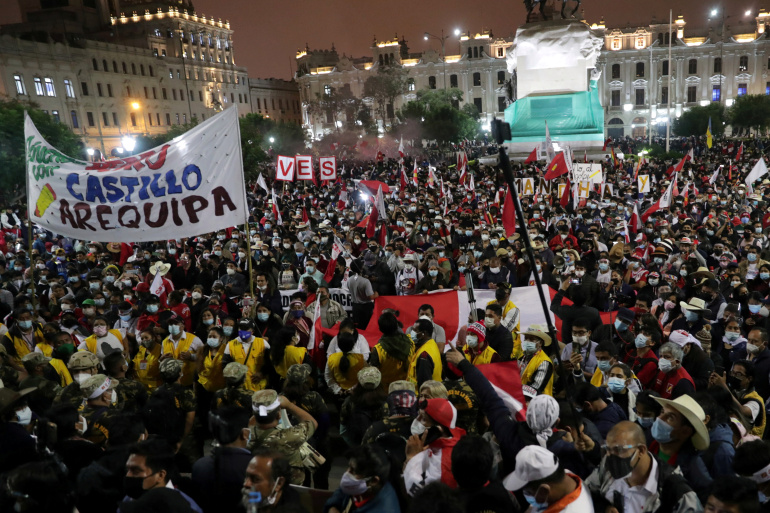 Supporters of Peru's presidential candidate Pedro Castillo gather in Plaza San Martin in Lima, Peru June 19, 2021. REUTERS/Sebastian Castaneda