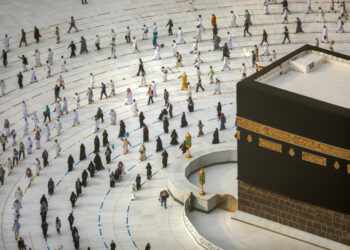 A handout picture provided by Saudi Ministry of Media on August 2, 2020 shows Muslim pilgrims circumambulating around the Kaaba, Islam's holiest shrine, at the centre of the Grand Mosque in the holy city of Mecca, while mask-clad and along specific pre-ordained rings as measures due to the COVID-19 coronavirus pandemic, on the final day of the annual Muslim Hajj pilgrimage. - Massive crowds in previous years triggered deadly stampedes during the ritual, but this year only up to 10,000 Muslims are taking part after millions of international pilgrims were barred because of the covid-19 pandemic crisis. (Photo by - / Saudi Ministry of Media / AFP) / === RESTRICTED TO EDITORIAL USE - MANDATORY CREDIT "AFP PHOTO / HO / SAUDI MINISTRY OF MEDIA" - NO MARKETING NO ADVERTISING CAMPAIGNS - DISTRIBUTED AS A SERVICE TO CLIENTS ===