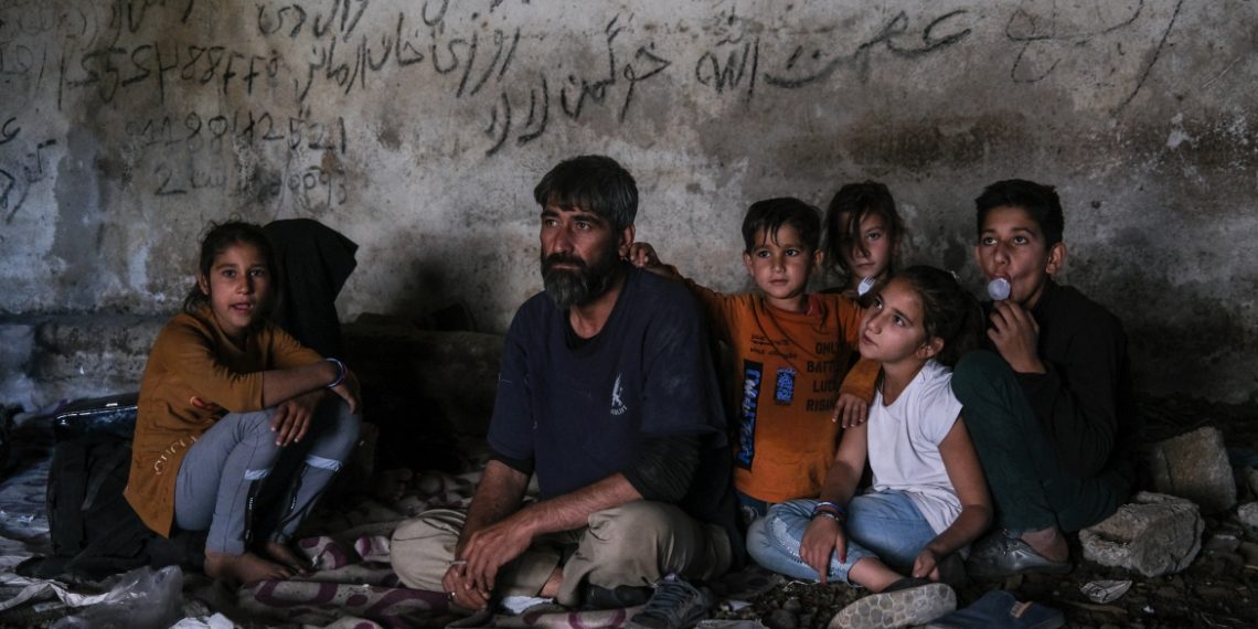 epa09323128 (21/33) An Afghan family rests in an abandoned shepherd's house near the Turkish city of Van after crossing the Iran-Turkey border, 08 June 2021.  Afghans, Pakistanis, and Iranians with no prospects of a decent future at home are forced to leap into the unknown and gamble on their quest for a dream that for many turns out to be a nightmare. For many is an all-or-nothing bet.  EPA-EFE/SEDAT SUNA ATTENTION: For the full PHOTO ESSAY text please see Advisory Notices epa09323103 and epa09323104