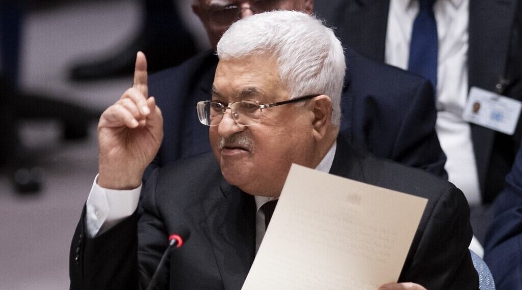 Palestinian president Mahmud Abbas speaks to the UN Security Council at the United Nations headquarters on February 11, 2020 in New York. - Palestinian president Mahmud Abbas on Tuesday told the UN Security Council that the world should reject President Donald Trump's Middle East plan, which he said would limit Palestinian sovereignty in a "Swiss cheese" deal. "We reject the Israeli-American plan," which "throws into question the legitimate rights of the Palestinians," Abbas said, brandishing a large map of Palestine as conceived by the US proposal. (Photo by Johannes EISELE / AFP)