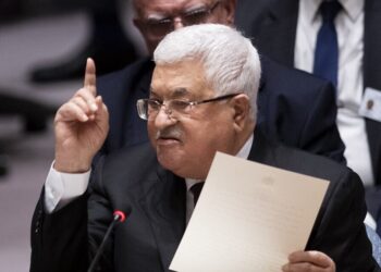 Palestinian president Mahmud Abbas speaks to the UN Security Council at the United Nations headquarters on February 11, 2020 in New York. - Palestinian president Mahmud Abbas on Tuesday told the UN Security Council that the world should reject President Donald Trump's Middle East plan, which he said would limit Palestinian sovereignty in a "Swiss cheese" deal. "We reject the Israeli-American plan," which "throws into question the legitimate rights of the Palestinians," Abbas said, brandishing a large map of Palestine as conceived by the US proposal. (Photo by Johannes EISELE / AFP)