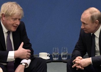 BERLIN, GERMANY - JANUARY 19, 2020: UK Prime Minister Boris Johnson and Russia's President Vladimir Putin (C L-R) talk during a meeting on the sidelines of an international summit on Libya; the summit is to discuss efforts to achieve peace and reconciliation between Libya's government and General Haftar; right: the Russian president's adviser Yuri Ushakov. Alexei Nikolsky/Russian Presidential Press and Information Office/TASS

Ãåðìàíèÿ. Áåðëèí. Ïðåìüåð-ìèíèñòð Âåëèêîáðèòàíèè Áîðèñ Äæîíñîí, ïðåçèäåíò Ðîññèè Âëàäèìèð Ïóòèí (â öåíòðå ñëåâà íàïðàâî) è ïîìîùíèê ïðåçèäåíòà ÐÔ Þðèé Óøàêîâ (ñïðàâà) âî âðåìÿ áåñåäû íà ïîëÿõ Áåðëèíñêîé êîíôåðåíöèè ïî Ëèâèè. Àëåêñåé Íèêîëüñêèé/ïðåññ-ñëóæáà ïðåçèäåíòà ÐÔ/ÒÀÑÑ