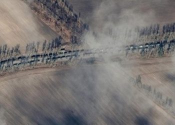 Satellite images show three-plus mile long Russian military column on roadway to Kyiv

From CNN's Paul P. Murphy

 

As Ukrainians continue to repel Russian advances around Kyiv, new satellite images show a more than three-mile-long Russian military convoy is on a roadway that heads towards the capital city.

 

According to Maxar, the convoy was seen on satellite images on Sunday around 10:56 a.m. local time on the P-02-02 road near Ivankiv, which is about 40 miles or 60 kilometers northwest of the Ukrainian capital. The P-02-02 road heads towards Kyiv. 

 

Maxar identified fuel and logistical trucks, in addition to tanks, infantry vehicles and self-propelled artillery moving in the convoy.