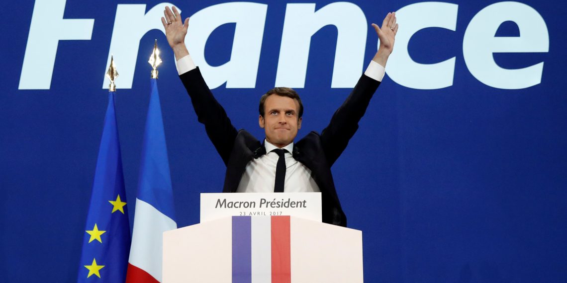 Emmanuel Macron, head of the political movement En Marche !, or Onwards !, and candidate for the 2017 French presidential election, celebrates after partial results in the first round of 2017 French presidential election, at the Parc des Expositions hall in Paris, France April 23, 2017.   REUTERS/Benoit Tessier