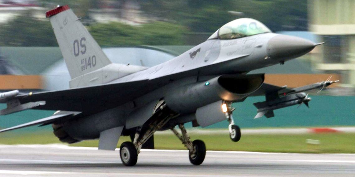 PAYA LEBAR AIR BASE, Singapore -- An F-16 Fighting Falcon from the 36th Fighter Squadron at Osan Air Base, South Korea, lands here after a mission during Commando Sling 04-3.  U.S. and Singaporean Airmen trained together using realistic dissimilar air-to-air combat tactics.  (U.S. Air Force photo by Master Sgt. Val Gempis)