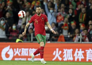 Portugal's Bruno Fernandes eyes the ball during the World Cup 2022 playoff soccer match between Portugal and North Macedonia, at the Dragao stadium in Porto, Portugal, Tuesday, March 29, 2022. (AP Photo/Luis Vieira)