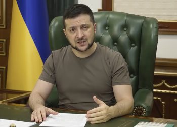 In this image from video provided by the Ukrainian Presidential Press Office, Ukrainian President Volodymyr Zelenskyy speaks from Kyiv, Ukraine, early Monday, March 21, 2022. (Ukrainian Presidential Press Office via AP)