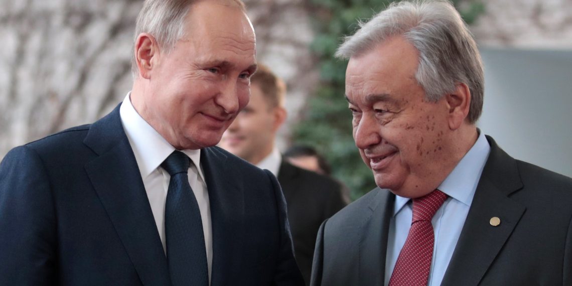 United Nations Secretary-General Antonio Guterres welcomes Russian President Vladimir Putin at the Libya summit in Berlin, Germany, January 19, 2020.  REUTERS/Axel Schmidt