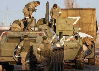 ARMYANSK, CRIMEA, RUSSIA Ц MARCH 2, 2022: Military hardware moves along the street. Early on 24 February, Russia's President Putin announced his decision to launch a special military operation after considering requests from the leaders of the Donetsk People's Republic and Lugansk People's Republic. Sergei Malgavko/TASS

–осси€. –еспублика  рым. јрм€нск. ¬оенна€ техника на одной из улиц города. ”тром 24 феврал€ президент –‘ ¬ладимир ѕутин объ€вил, что в ответ на обращение руководителей Ћуганской и ƒонецкой народных республик он прин€л решение о проведении специальной военной операции. —ергей ћальгавко/“ј——