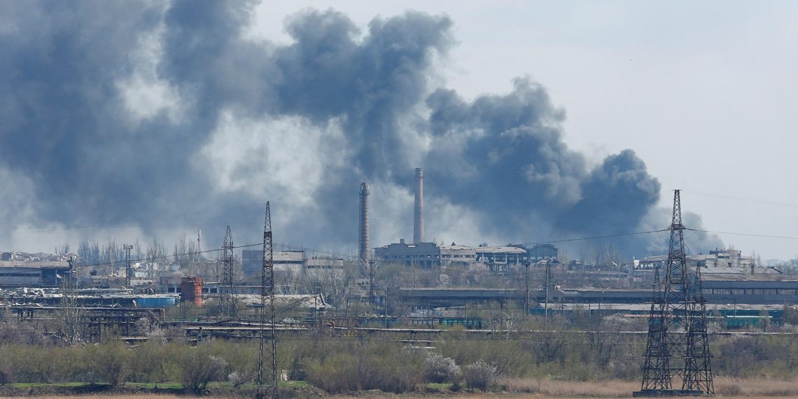 Smoke rises above a plant of Azovstal Iron and Steel Works company during Ukraine-Russia conflict in the southern port city of Mariupol, Ukraine April 20, 2022. REUTERS/Alexander Ermochenko