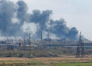 Smoke rises above a plant of Azovstal Iron and Steel Works company during Ukraine-Russia conflict in the southern port city of Mariupol, Ukraine April 20, 2022. REUTERS/Alexander Ermochenko