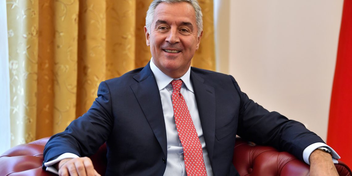 epa07888337 Montenegro President Milo Djukanovic smiles during a meeting with his North Macedonia's counterpart in Skopje, North Macedonia, 02 October 2019. Djukanovic is on a two-day official visit to North Macedonia.  EPA-EFE/GEORGI LICOVSKI