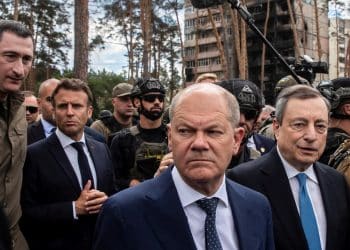 Ukrainian Minister for Communities and Territories Development Oleksiy Chernyshov walks next to French President Emmanuel Macron, German Chancellor Olaf Scholz, Italian Prime Minister Mario Draghi and Romanian President Klaus Iohannis during their visit, as Russia's attack on Ukraine continues, in Irpin, near Kyiv, Ukraine June 16, 2022.  REUTERS/Viacheslav Ratynskyi