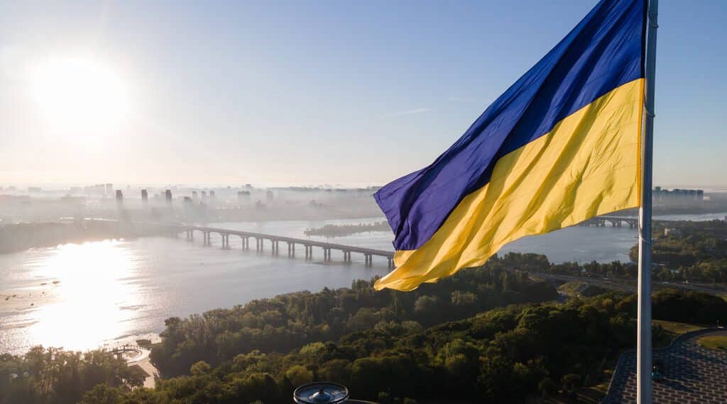 Kyiv - National flag of Ukraine by day. Aerial. Kiev