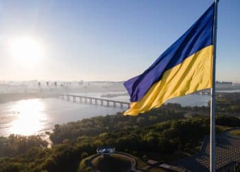 Kyiv - National flag of Ukraine by day. Aerial. Kiev