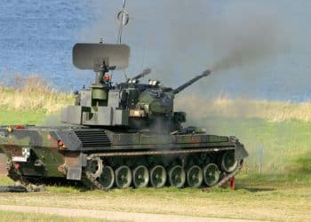 This handout photo taken at the military base camp in Todendorf, northern Germany on October 7, 2004 and provided by the German armed forces Bundeswehr on April 26, 2022 shows a Gepard anti-aircraft gun tank (FlakPz) shooting at air targets during a practice. - Germany will authorise the delivery of tanks to Ukraine, Defence Minister Christine Lambrecht said on April 26, 2022, in what would be a clear switch in Berlin's cautious policy on military backing for Kyiv. (Photo by Michael MANDT / BUNDESWEHR / AFP) / RESTRICTED TO EDITORIAL USE - MANDATORY CREDIT 'AFP PHOTO / HANDOUT /MICHAEL MANDT  / BUNDESWEHR' - NO MARKETING - NO ADVERTISING CAMPAIGNS - DISTRIBUTED AS A SERVICE TO CLIENTS