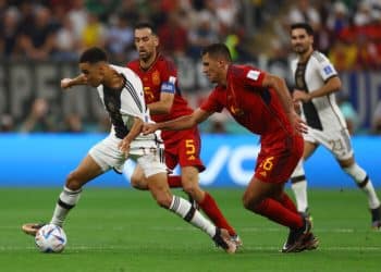 Soccer Football - FIFA World Cup Qatar 2022 - Group E - Spain v Germany - Al Bayt Stadium, Al Khor, Qatar - November 27, 2022 Spain's Sergio Busquets fouls Germany's Jamal Musiala before being shown yellow card REUTERS/Kai Pfaffenbach - UP1EIBR1IWWL5