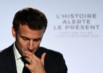 French President Emmanuel Macron gestures as he delivers a speech at the Camp des Milles memorial site, in Aix-en-Provence, France, on December 5, 2022.     CHRISTOPHE SIMON/Pool via REUTERS