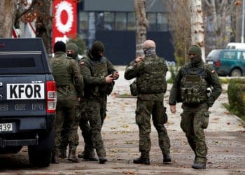 Polish KFOR soldiers patrol in North Mitrovica, Kosovo December 13, 2022. REUTERS/Ognen Teofilovski