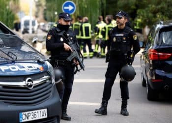 Police stands outside of Ukrainian embassy after, Spanish police said, blast at embassy building injured one employee while handling a letter, in Madrid, Spain November 30, 2022. REUTERS/Juan Medina