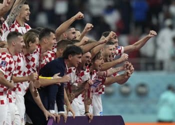 Croatia's head coach Zlatko Dalic and players celebrate after their win in the World Cup third-place playoff soccer match against Morocco at Khalifa International Stadium in Doha, Qatar, Saturday, Dec. 17, 2022. (AP Photo/Francisco Seco)