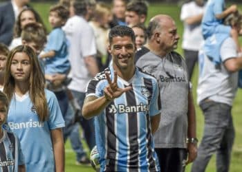 Uruguayan player Luis Suarez smiles during his official presentation as Gremio´s new player during an event at the Gremio Arena stadium, in Porto Alegre, Brazil, Wednesday, Jan. 4, 2023. (AP Photo/Wesley Santos)