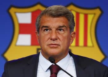 FILE - FC Barcelona club President Joan Laporta pauses during a news conference in Barcelona, Spain, on Aug. 6, 2021. Barcelona won’t be able to reduce its salary burden to acceptable limits for the club until several veteran players finish their contracts, its top financial officer said Thursday, Oct. 6, 2022. (AP Photo/Joan Monfort, File)