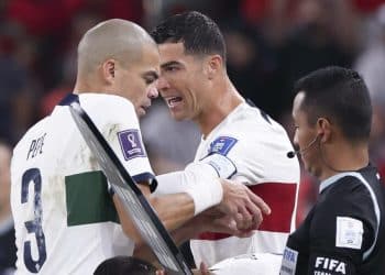 221210 -- DOHA, Dec. 10, 2022 -- Portugal s Pepe L gives the captain s armband to Cristiano Ronaldo before he gets onto the pitch during the second-half of the Quarterfinal between Morocco and Portugal of the 2022 FIFA World Cup, WM, Weltmeisterschaft, Fussball at Al Thumama Stadium in Doha, Qatar, Dec. 10, 2022.  SPQATAR-DOHA-2022 WORLD CUP-QUARTERFINAL-MAR VS POR CaoxCan PUBLICATIONxNOTxINxCHN