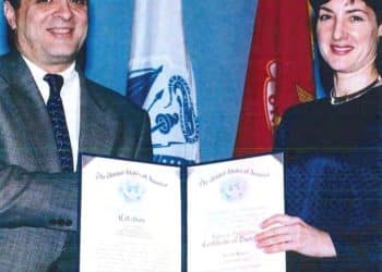 An undated handout image from a U.S. Department of Defense report dating back to 2005 shows Ana Belen Montes receiving a national intelligence certificate of distinction from George Tenet, who served as Director of Central Intelligence (DCI) for the United States Central Intelligence Agency. U.S. Department of Defense/Handout via REUTERS    THIS IMAGE HAS BEEN SUPPLIED BY A THIRD PARTY