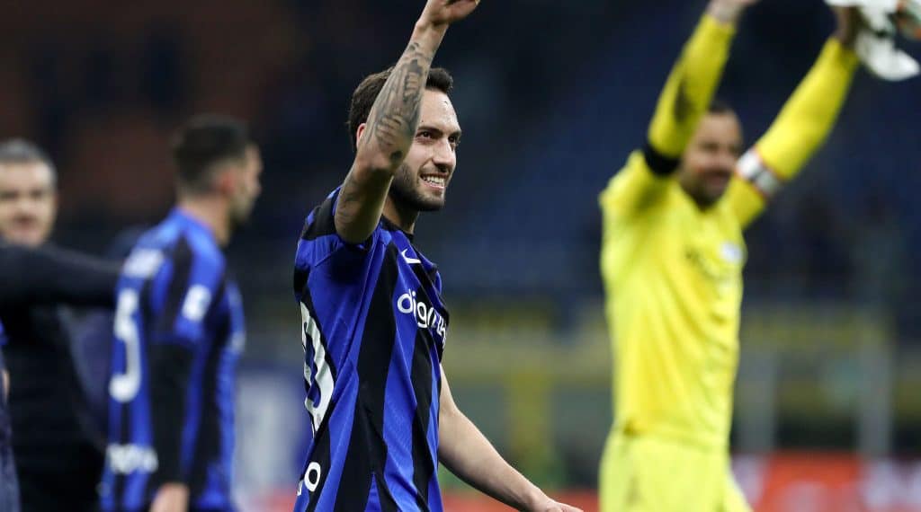 MILAN, ITALY - FEBRUARY 18: Hakan Calhanoglu of FC Internazionale acknowledges the fans after the Serie A match between FC Internazionale and Udinese Calcio at Stadio Giuseppe Meazza on February 18, 2023 in Milan, Italy. (Photo by Marco Luzzani/Getty Images)