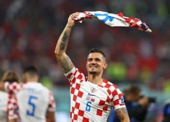 Soccer Football - FIFA World Cup Qatar 2022 - Third-Place Playoff - Croatia v Morocco - Khalifa International Stadium, Doha, Qatar - December 17, 2022 Croatia's Dejan Lovren celebrates after the match as they finish in third place REUTERS/Molly Darlington