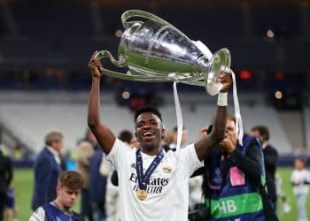 PARIS, FRANCE - MAY 28: Vinicius Junior of Real Madrid celebrates with the UEFA Champions League Trophy after their sides victory in the UEFA Champions League final match between Liverpool FC and Real Madrid at Stade de France on May 28, 2022 in Paris, France. (Photo by Catherine Ivill/Getty Images)