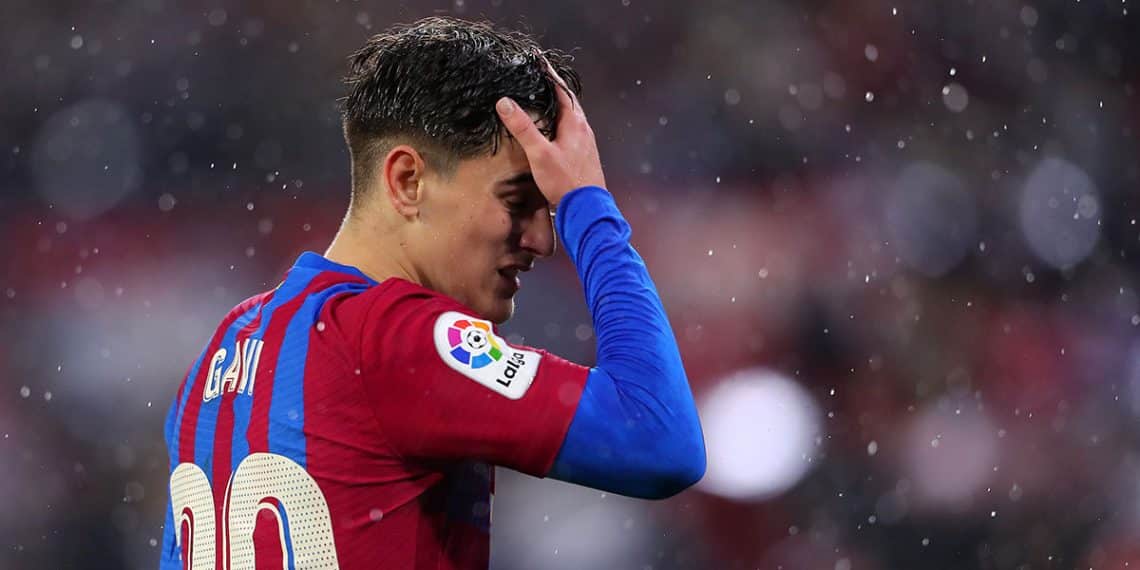 SEVILLE, SPAIN - DECEMBER 21: Gavi of FC Barcelona reacts during the LaLiga Santander match between Sevilla FC and FC Barcelona at Estadio Ramon Sanchez Pizjuan on December 21, 2021 in Seville, Spain. (Photo by Fran Santiago/Getty Images)