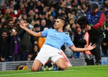 MANCHESTER, ENGLAND - APRIL 11: Rodri of Manchester City celebrates after scoring the team's first goal during the UEFA Champions League quarterfinal first leg match between Manchester City and FC Bayern München at Etihad Stadium on April 11, 2023 in Manchester, England. (Photo by Shaun Botterill/Getty Images)