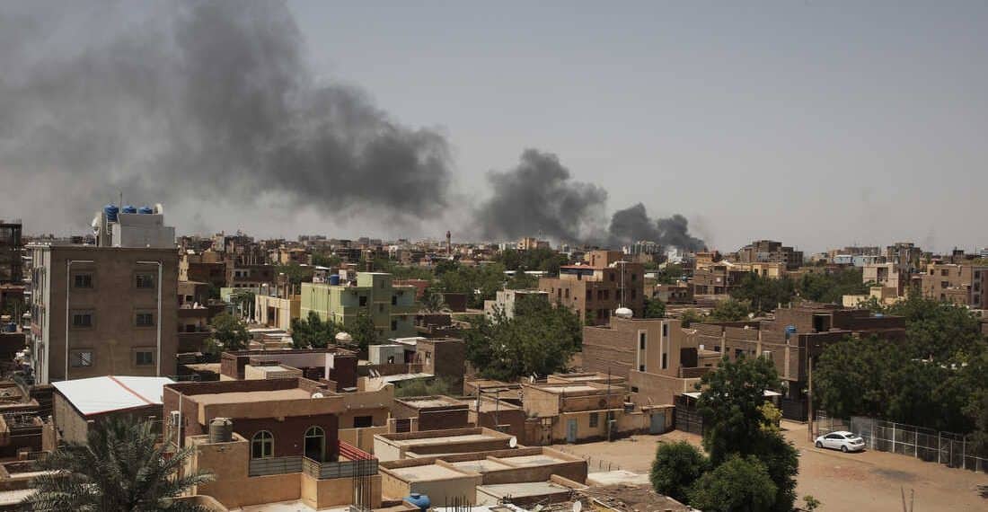 Smoke is seen in Khartoum, Sudan, Saturday, April 22, 2023. The fighting in the capital between the Sudanese Army and Rapid Support Forces resumed after an internationally brokered cease-fire failed. (AP Photo/Marwan Ali)