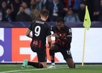 Naples, Italy, 18th April 2023. Olivier Giroud of AC Milan celebrates with team mate Rafael Leao of AC Milan after scoring to give the side a 1-0 lead during the UEFA Champions League match at Stadio Diego Armando Maradona, Naples. Picture credit should read: Jonathan Moscrop / Sportimage EDITORIAL USE ONLY. No use with unauthorised audio, video, data, fixture lists, club/league logos or live services. Online in-match use limited to 120 images, no video emulation. No use in betting, games or single club/league/player publications. SPI-2373-0025