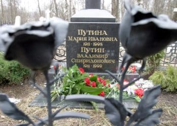 A picture taken on April 23, 2005 shows the headstone at the grave of Vladimir Putin's parents, Vladimir Spiridonovich and Maria Ivanovna, at Saint Petersburg's Serafimovskoye cemetery. Vladimir Putin was born and lived in Saint Petersburg previously named Leningrad for some 40 years, excluding his time as a KGB officer in East Germany, before moving to Moscow in the mid-1990s. (Photo by Kirill KUDRYAVTSEV / AFP)