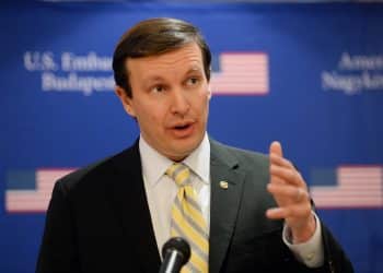 Junior United States Senator from Connecticut Chris Murphy addresses journalists in Budapest on January 31, 2014. The senator met with Hungarian Prime Minister Viktor Orban and representatives of the Hungarian opposition.  AFP PHOTO / ATTILA KISBENEDEK        (Photo credit should read ATTILA KISBENEDEK/AFP via Getty Images)