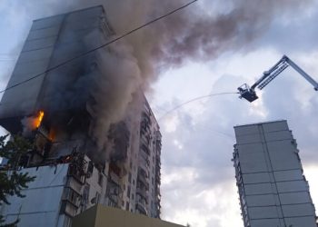 In this photo provided by the Ukrainian Emergency Service, rescuers work to extinguish a fire following an explosion caused by a gas leak in a 16-story residential building in Kyiv, Ukraine, Thursday, June 22, 2023. (Ukrainian Emergency Service via AP Photo)