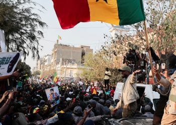 Senegalese opposition leader Ousmane Sonko greets his supporters as he attends the protest to demand the release of alleged political prisoners ahead of his court appearance on Thursday on libel charges, in Dakar, Senegal March 14, 2023. REUTERS/Zohra Bensemra